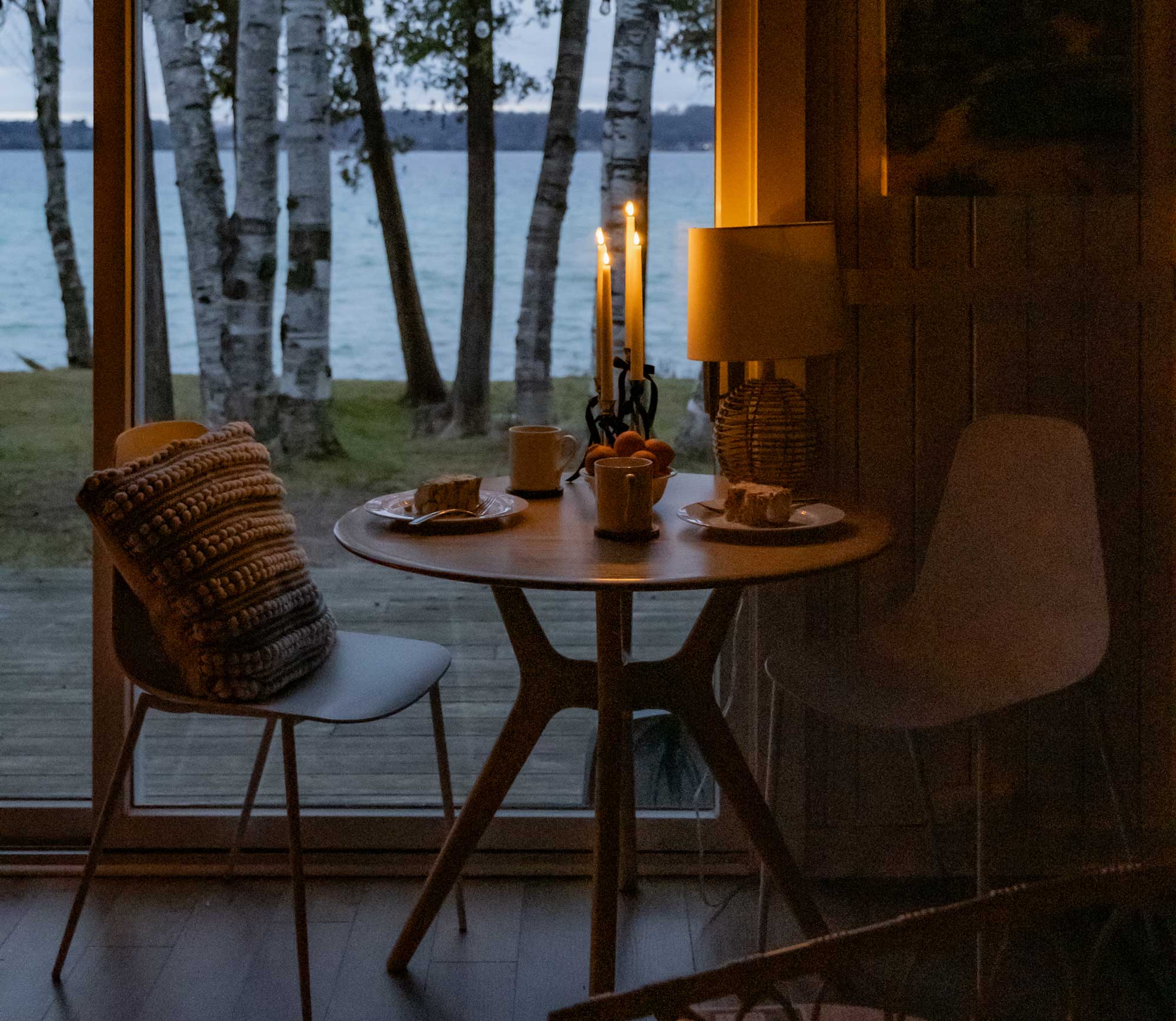 Dining Chairs sitting at table with romantic candlelight